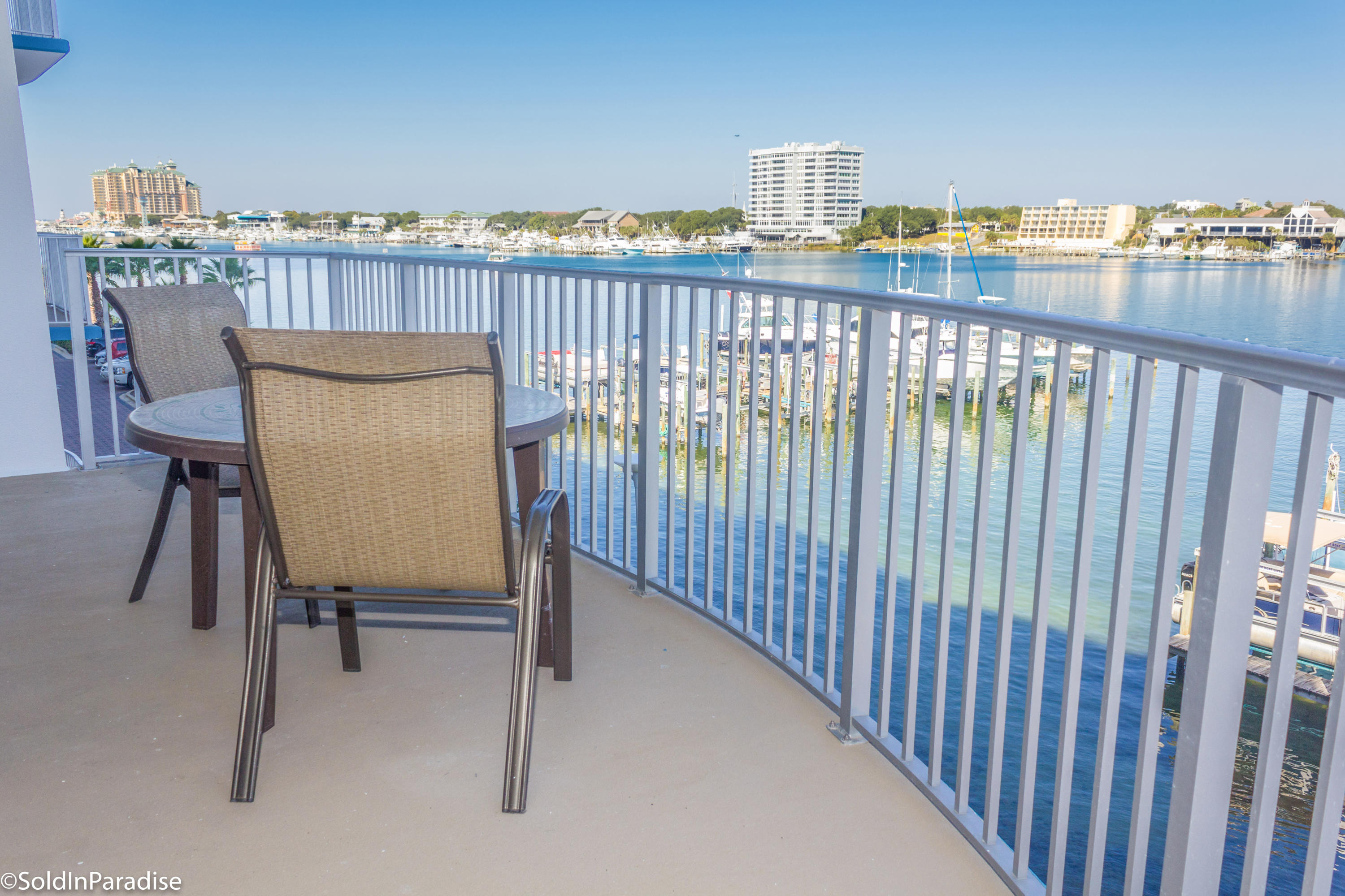 211 Durango Road, Unit 316 Destin, FL 32541 - Photo 6 of 48 a view of a balcony with chairs