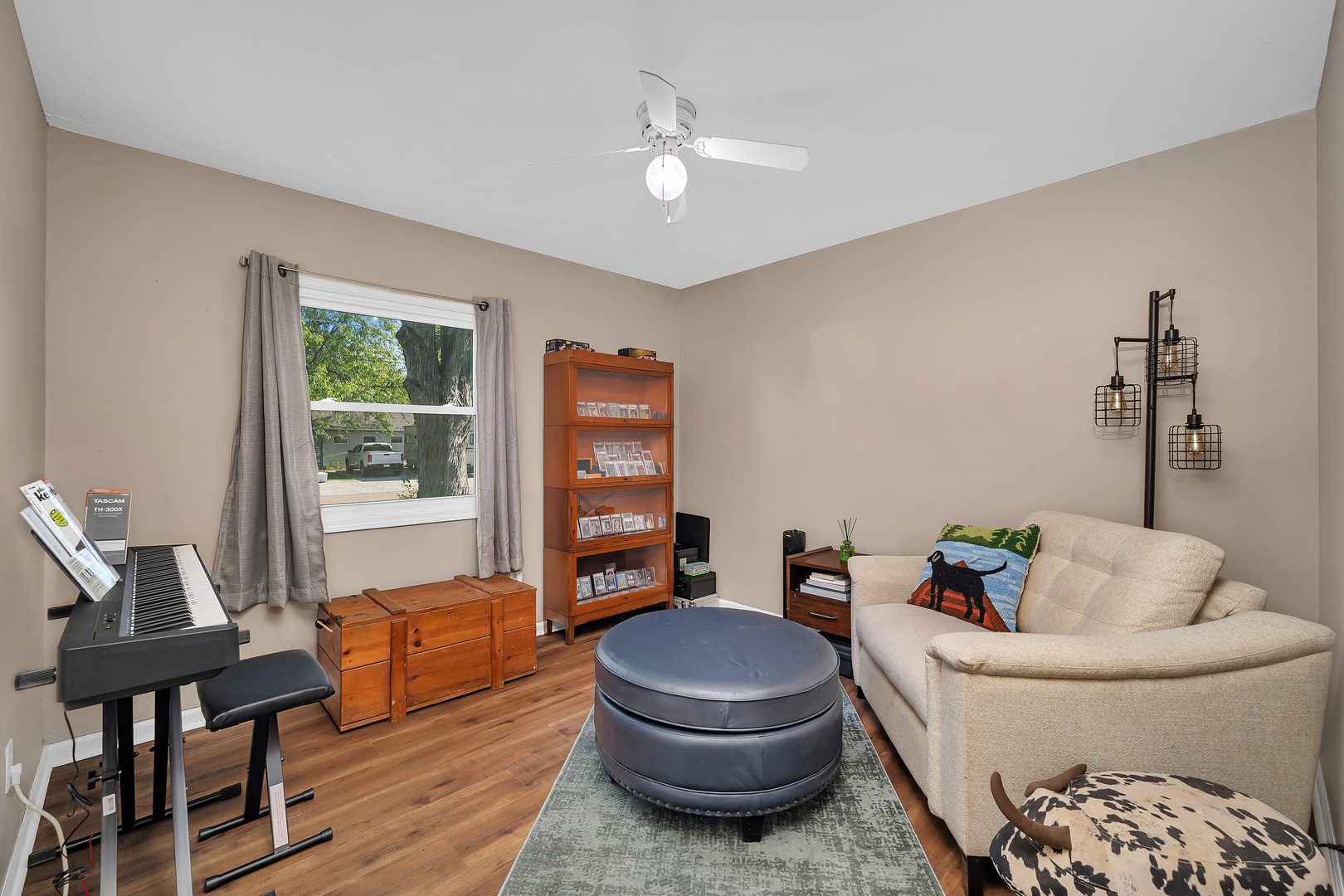338 Orchard Lane Braidwood, IL 60408 - Photo 19 of 25 a living room with furniture and a window