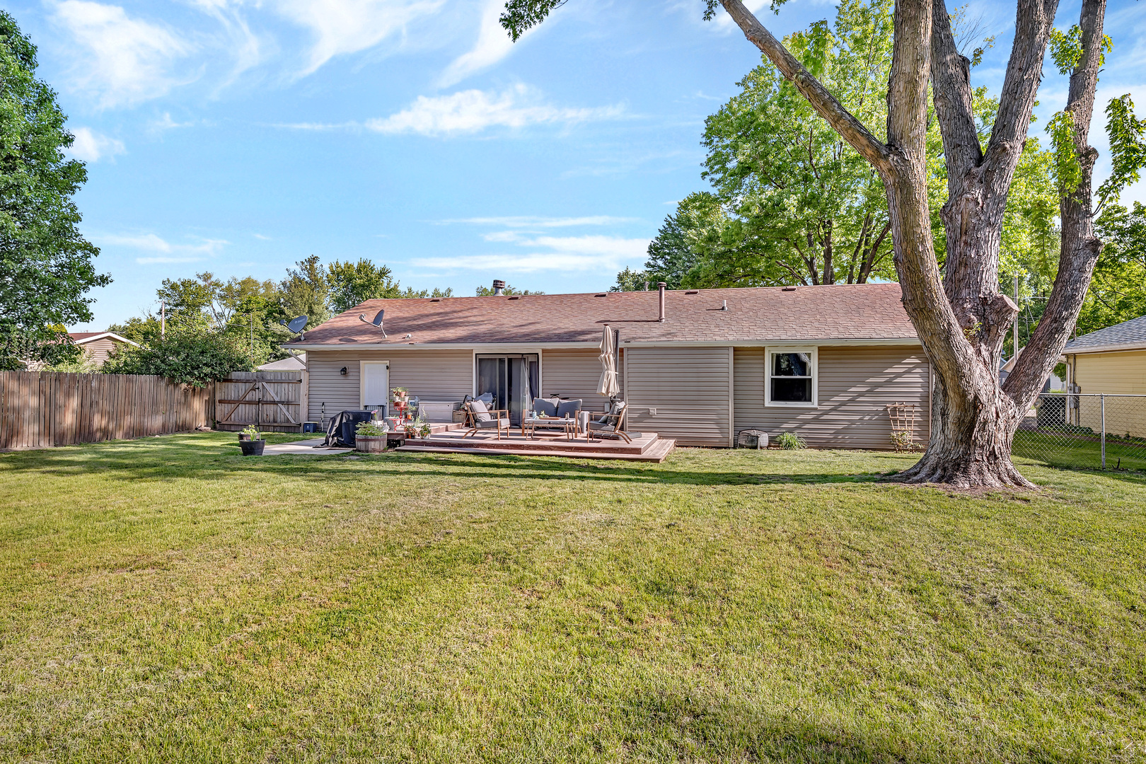 338 Orchard Lane Braidwood, IL 60408 - Photo 22 of 25 a front view of house with yard and seating area