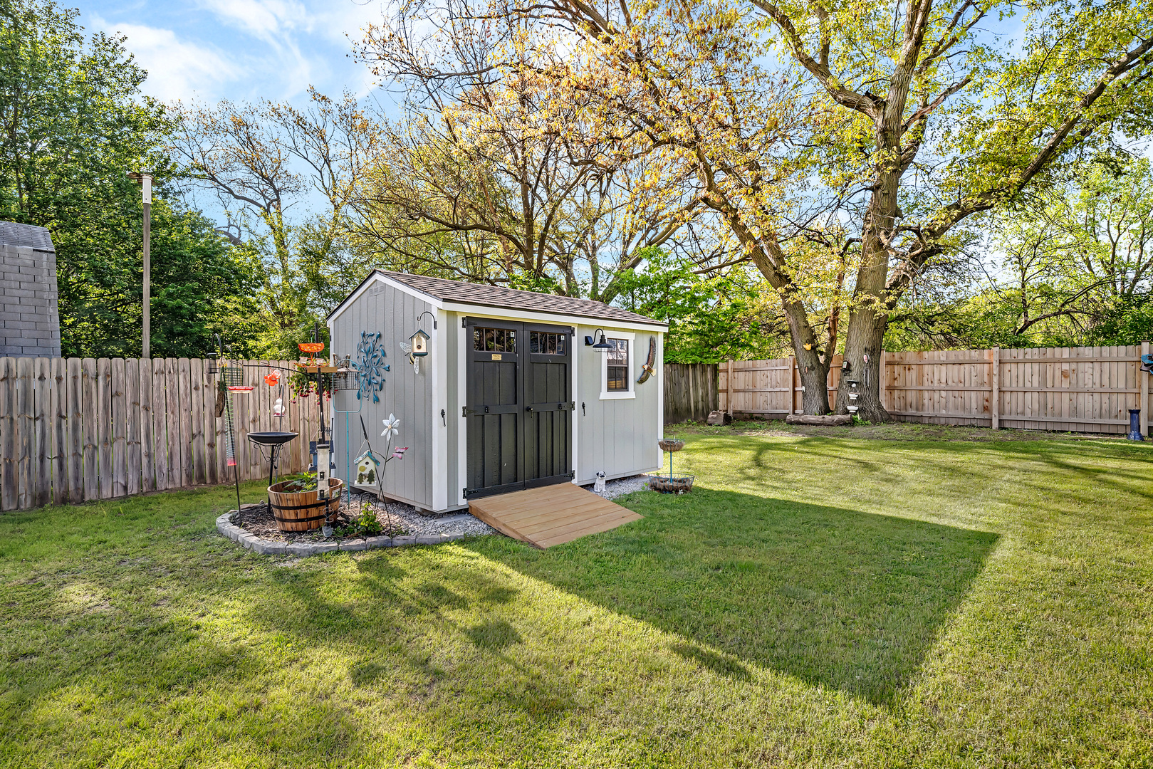 338 Orchard Lane Braidwood, IL 60408 - Photo 25 of 25 a view of a house with backyard and tree