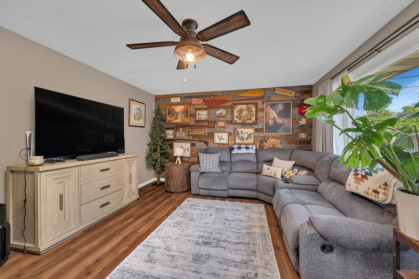 338 Orchard Lane Braidwood, IL 60408 - Photo 6 of 25 a living room with furniture and a flat screen tv