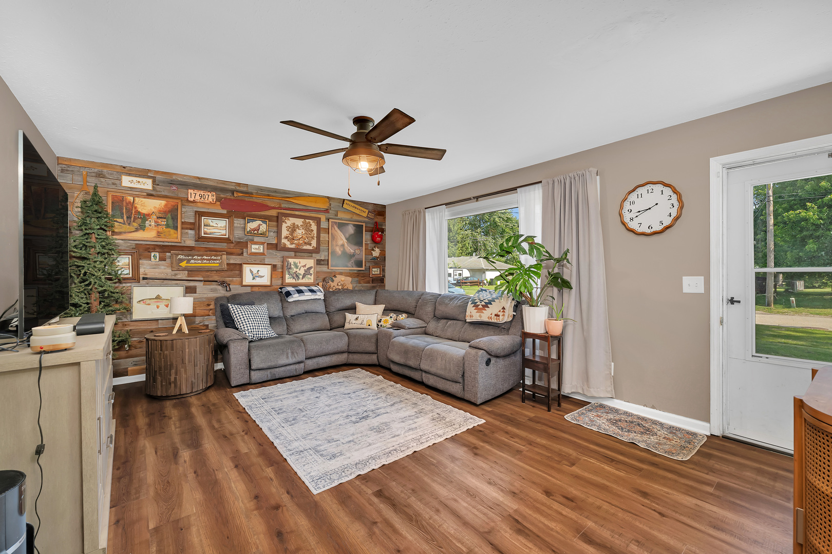 338 Orchard Lane Braidwood, IL 60408 - Photo 7 of 25 a living room with furniture and a large window