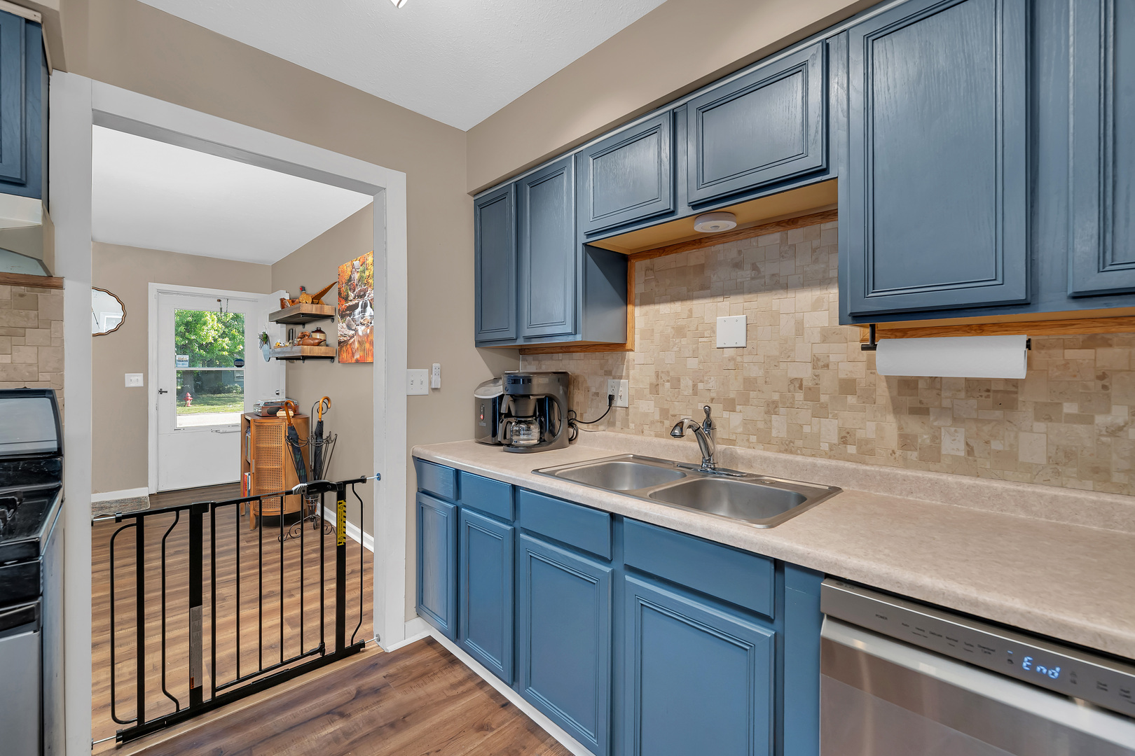 338 Orchard Lane Braidwood, IL 60408 - Photo 9 of 25 a kitchen with sink cabinets and window