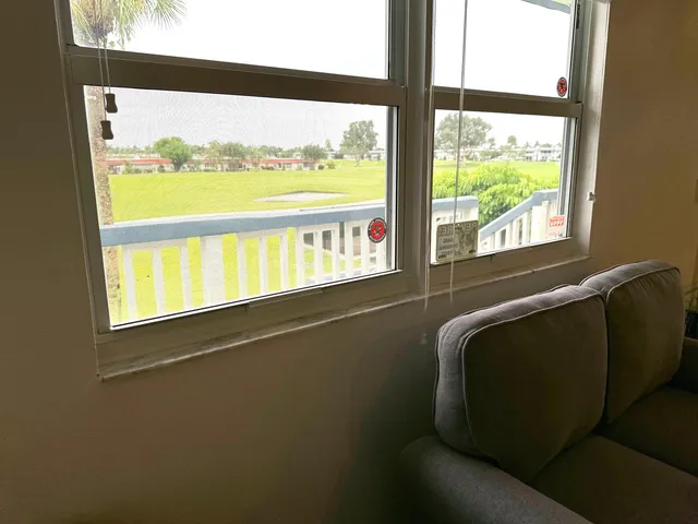 a living room with a large window