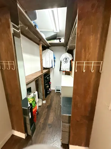 a view of living room with furniture and flat screen tv