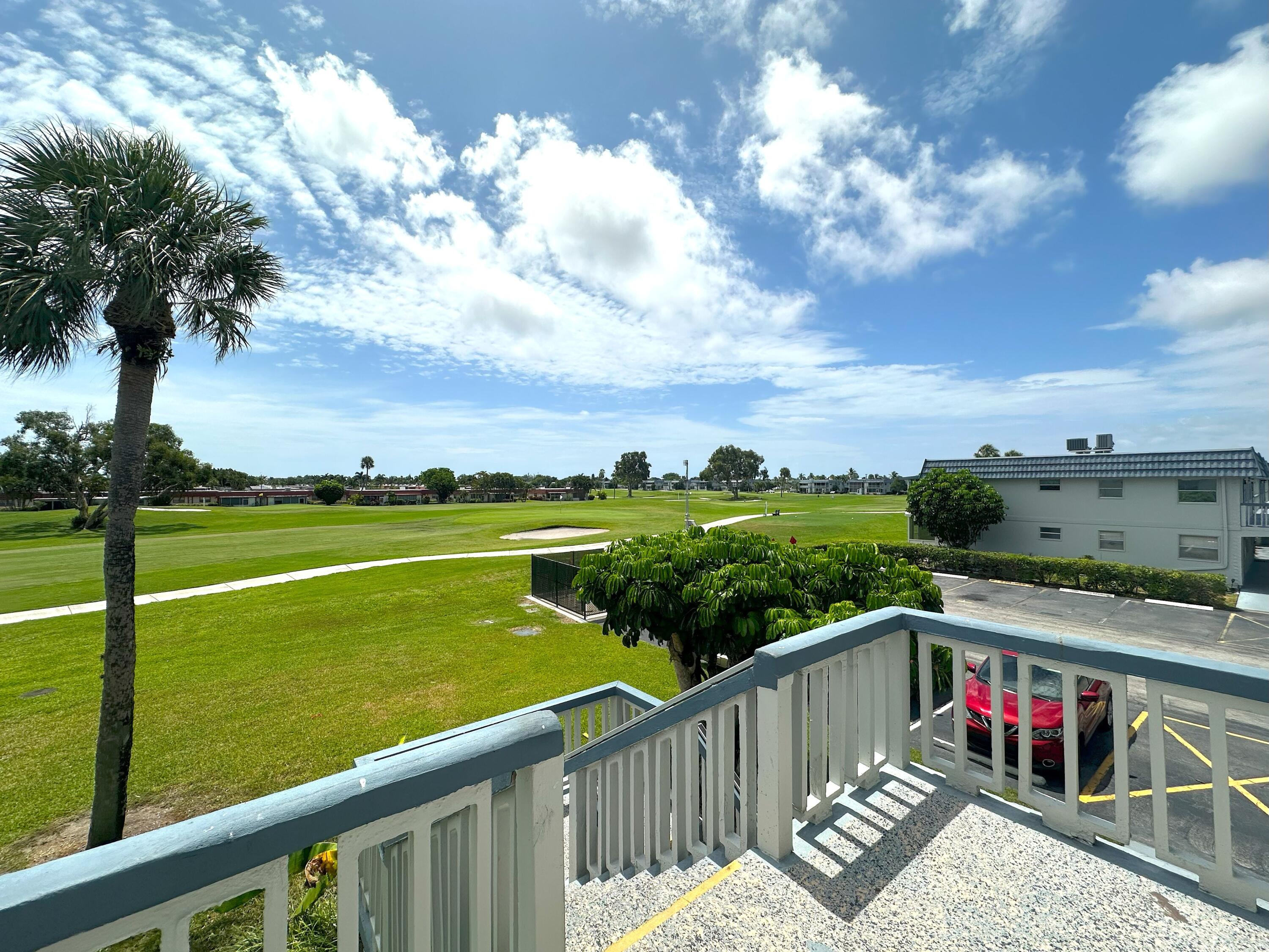 196 Tuscany C Delray Beach, FL 33446 - Photo 30 of 39 a view of a balcony with lake view