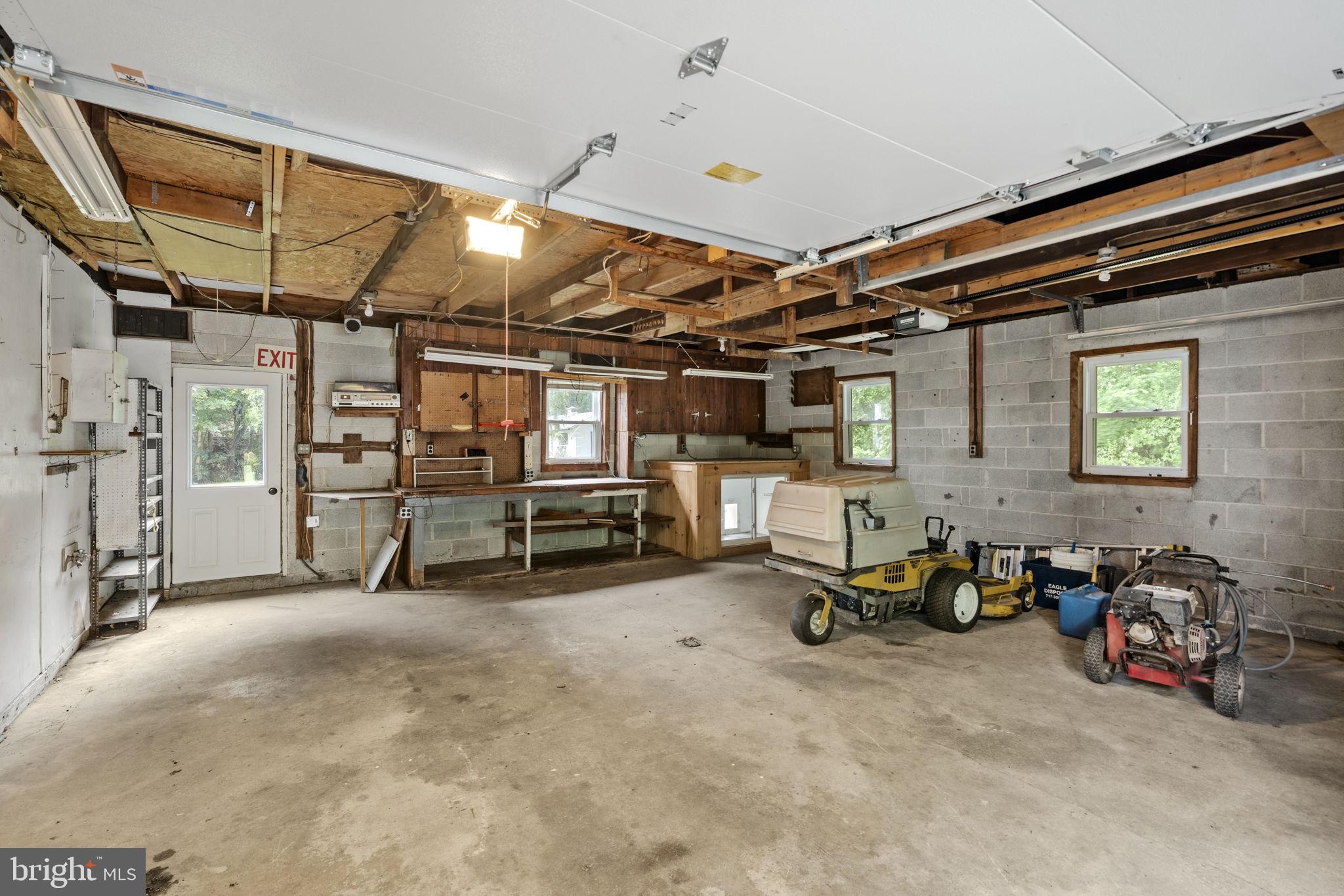 65 Compass Road Parkesburg, PA 19365 - Photo 51 of 61 Spacious garage with endless potential.