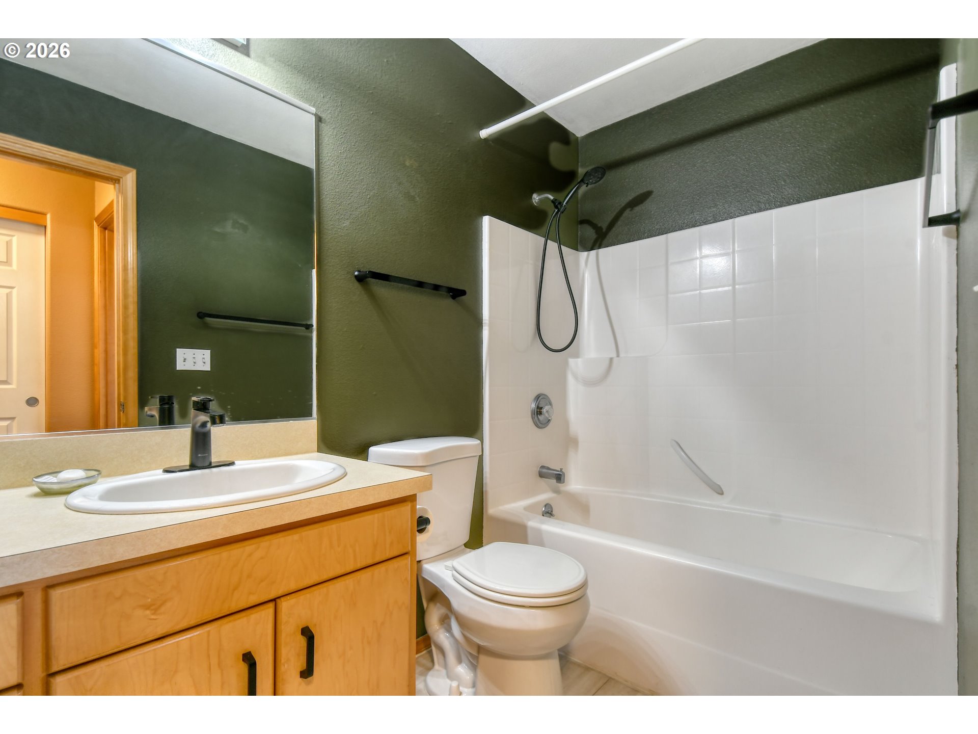 1614 Southwest 3rd Street Pendleton, OR 97801 - Photo 23 of 40 a bathroom with a sink a toilet and shower