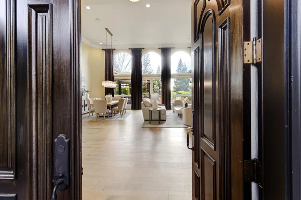 a view of a livingroom with furniture and front door
