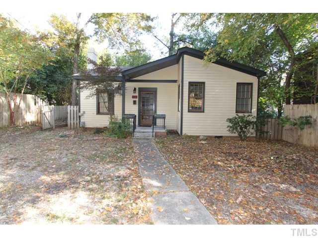 410 Chamberlain Street Raleigh, NC 27607 - Photo 1 of 14 a view of a house with a yard