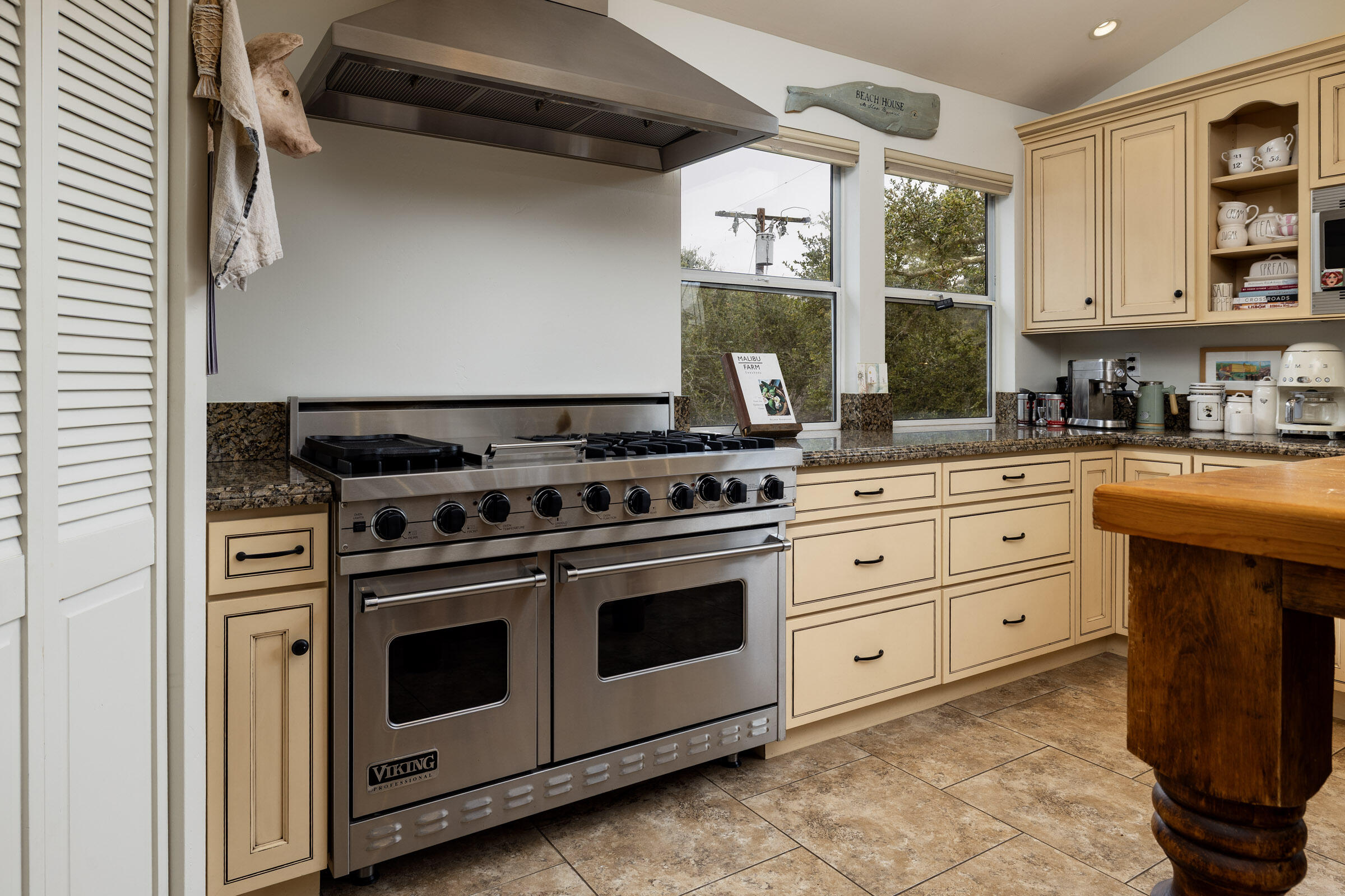 1352 Manitou Road Santa Barbara, CA 93101 - Photo 9 of 27 a white stove top oven sitting inside of a kitchen