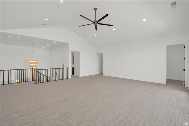1620 Belayer Drive St. George, UT 84770 - Photo 28 of 51 Spacious loft area featuring vaulted ceilings, recessed lighting, and neutral-tone carpeting