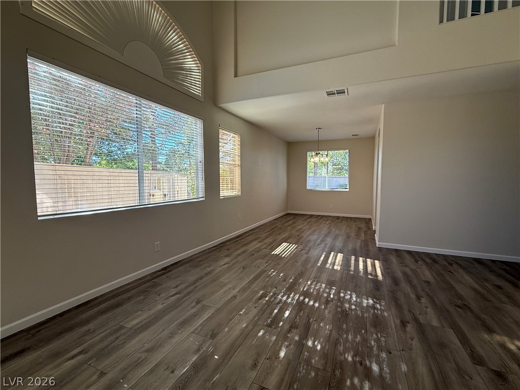 1908 Thunder Ridge Circle Henderson, NV 89012 - Photo 4 of 28 Natural light floods this room, highlighting the clean lines of the walls and ceiling.