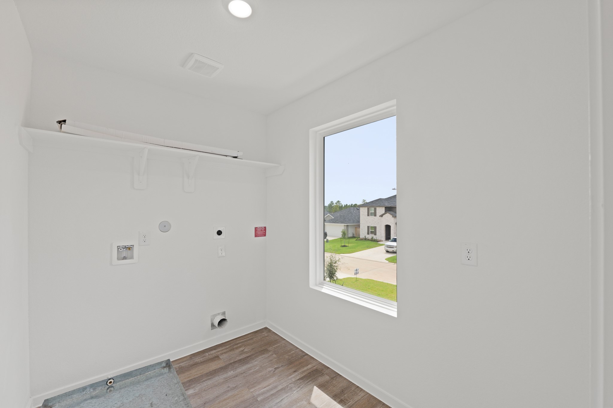 20026 Fibonacci Street New Caney, TX 77357 - Photo 14 of 22 a view of an empty room and window