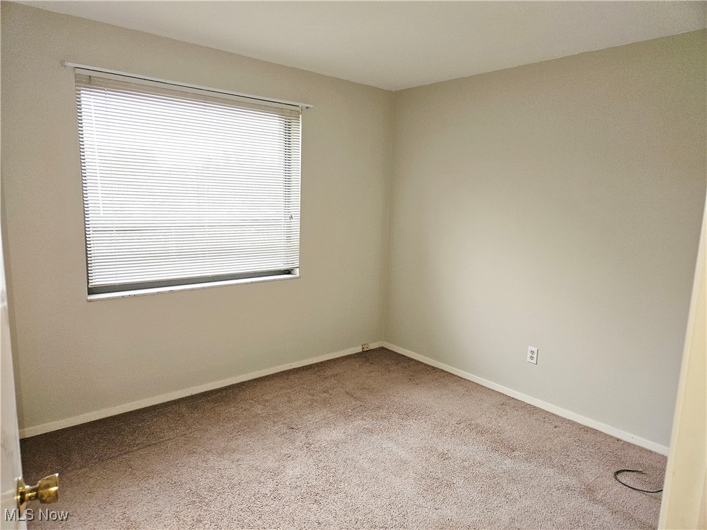 3400 Wooster Road, Unit 412 Rocky River, OH 44116 - Photo 13 of 34 Bedroom featuring carpet floors and plenty of natural light