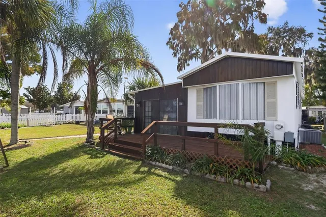 a view of house with outdoor seating and city view
