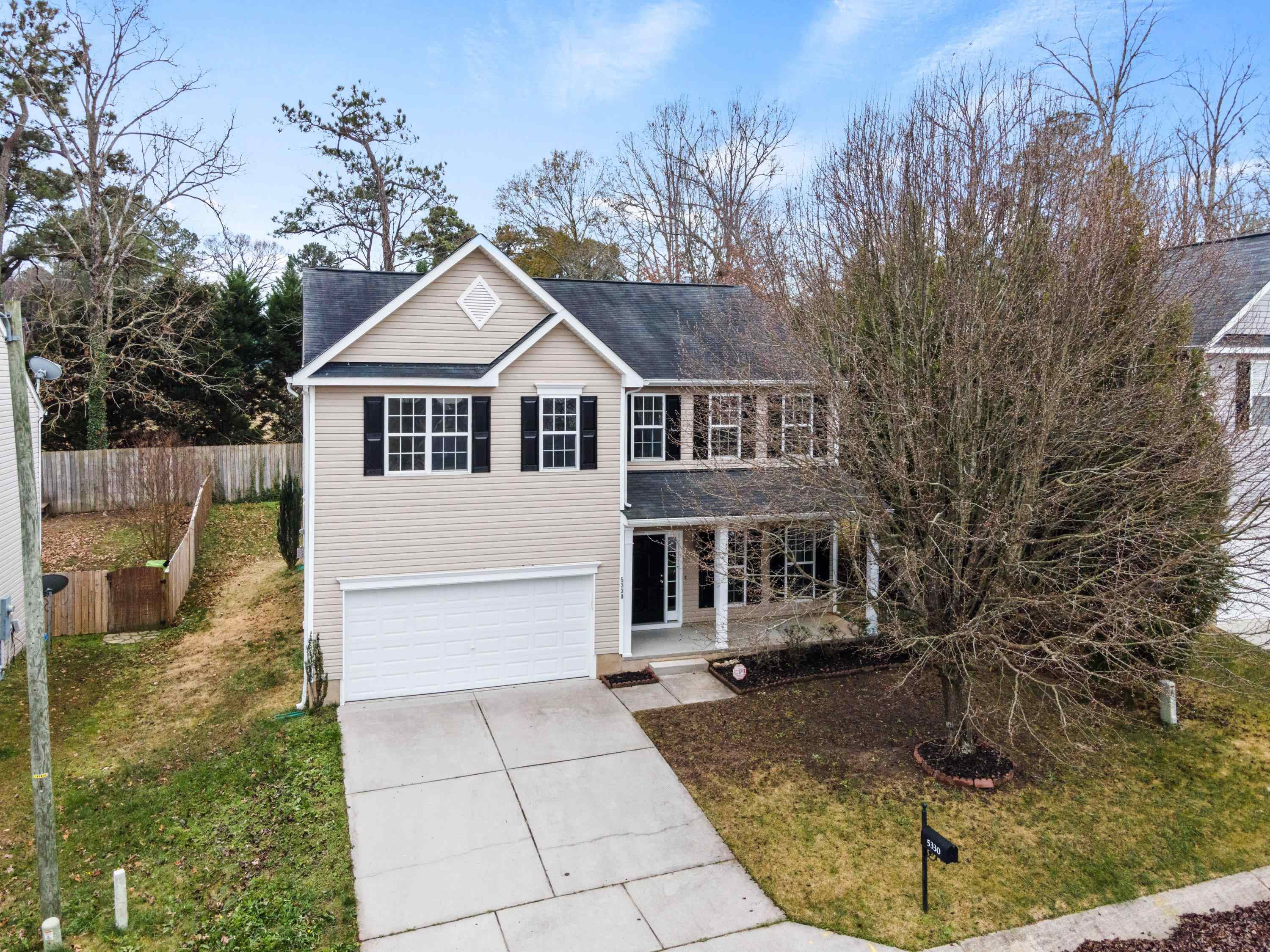 5330 Stowecroft Lane Raleigh, NC 27616 - Photo 5 of 46 a view of a house with a yard