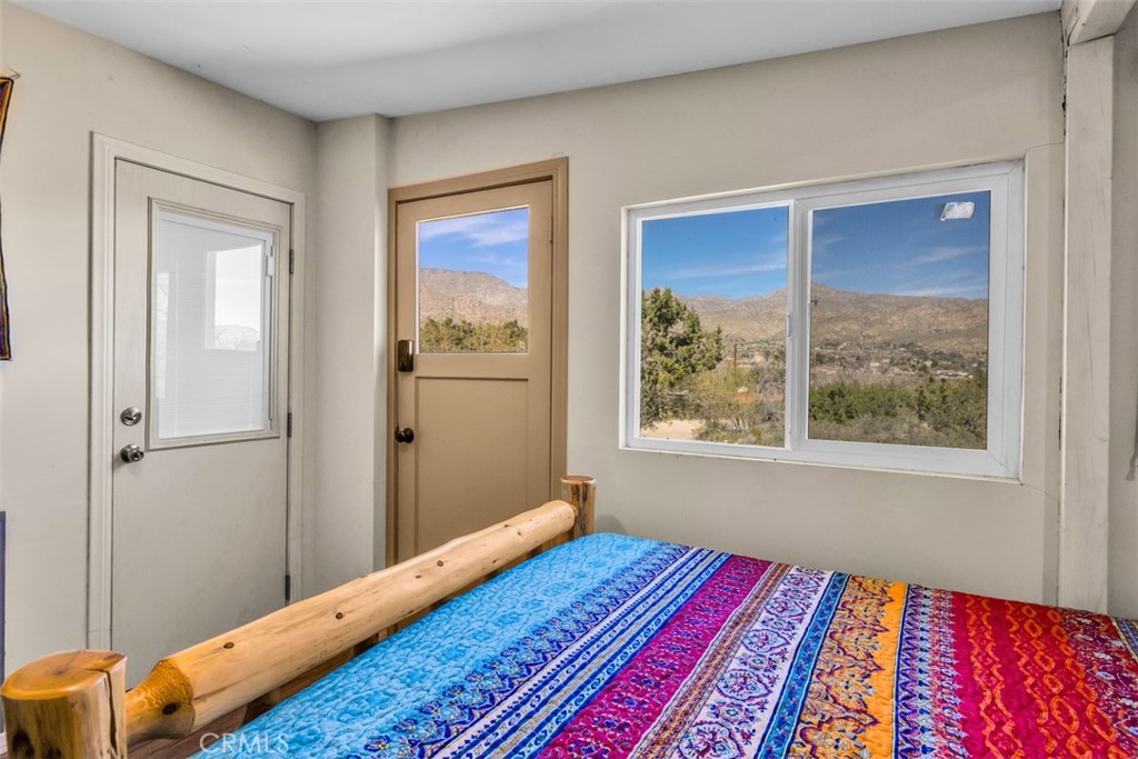 49399 Conejo Road Morongo Valley, CA 92256 - Photo 17 of 57 Guest bedroom