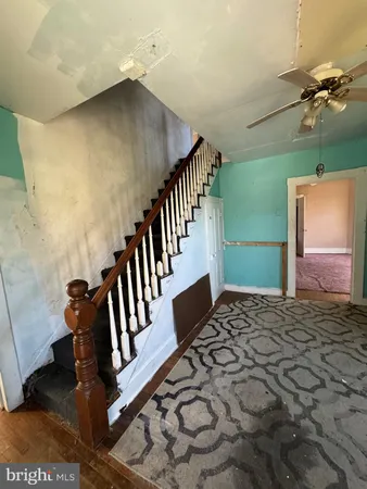 a view of an entryway with staircase