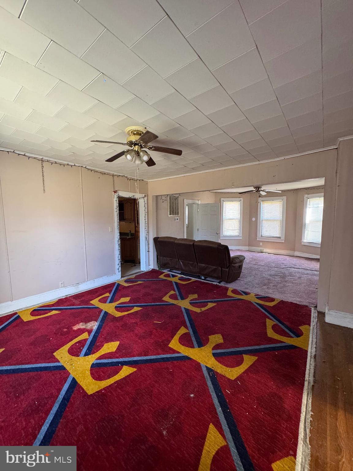 30432 Oak Street Princess Anne, MD 21853 - Photo 8 of 11 a bedroom with a bed and a lamp