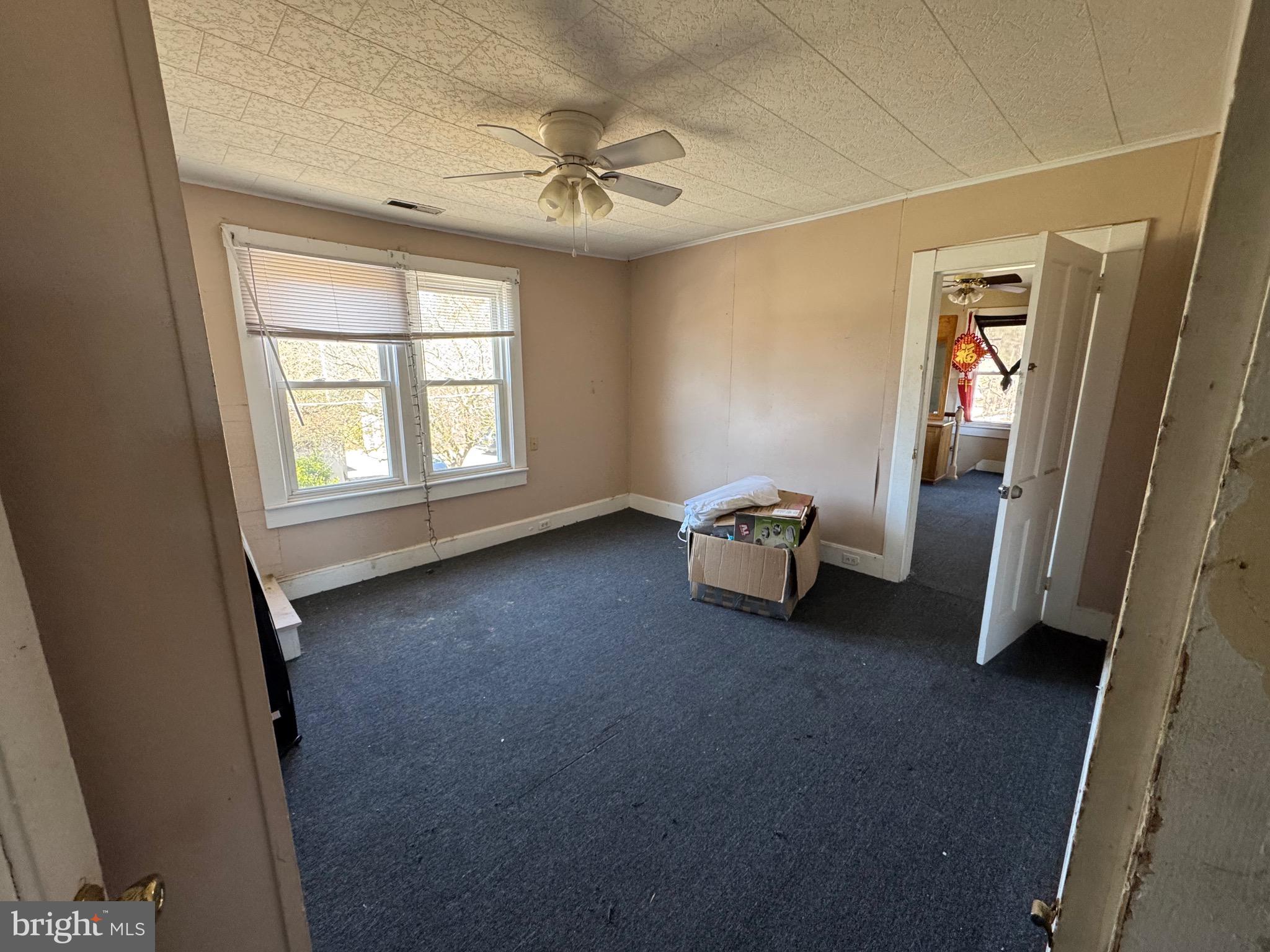 30432 Oak Street Princess Anne, MD 21853 - Photo 10 of 11 a view of a room with window and hardwood floor