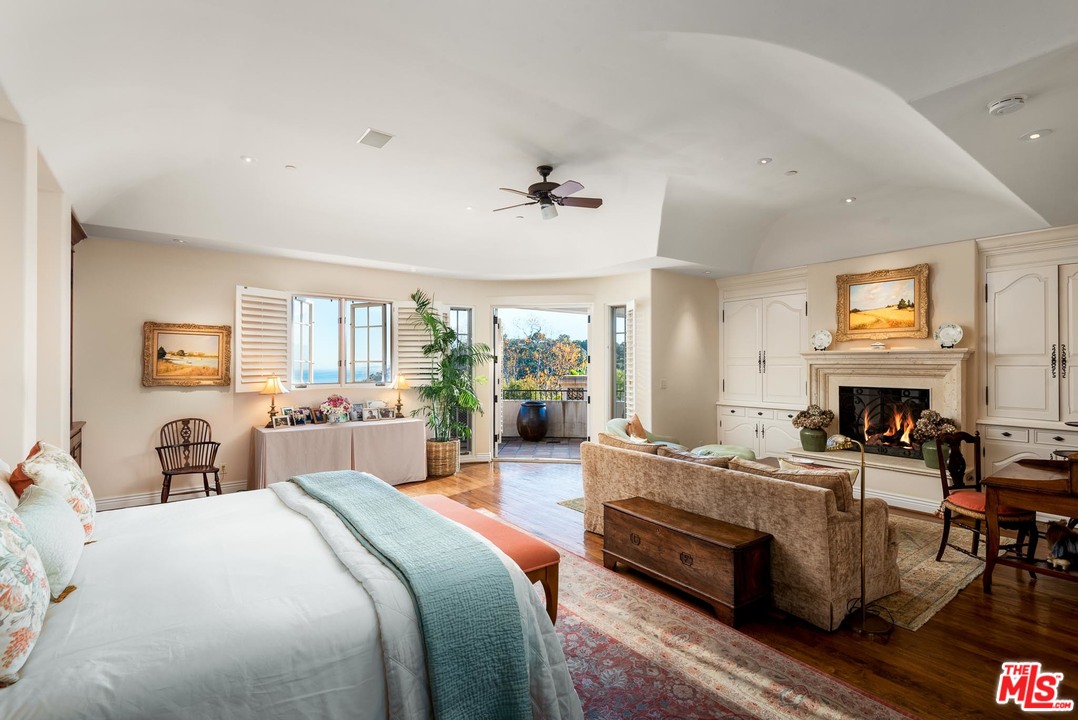 2838 East Valley Road Santa Barbara, CA 93108 - Photo 17 of 28 a bedroom with a bed couch and a window