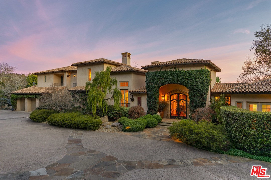 2838 East Valley Road Santa Barbara, CA 93108 - Photo 3 of 28 a front view of a house with garden
