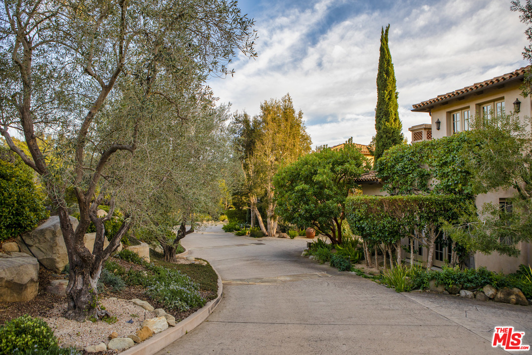 2838 East Valley Road Santa Barbara, CA 93108 - Photo 21 of 28 a pathway of a house with a yard