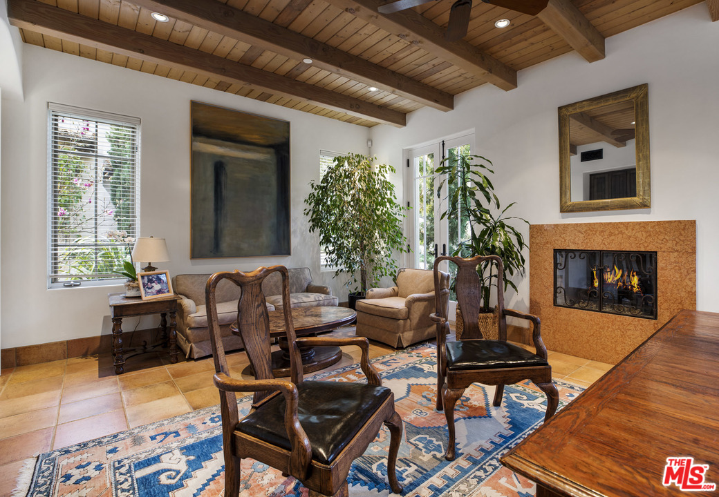 2838 East Valley Road Santa Barbara, CA 93108 - Photo 24 of 28 a living room with furniture and a fireplace