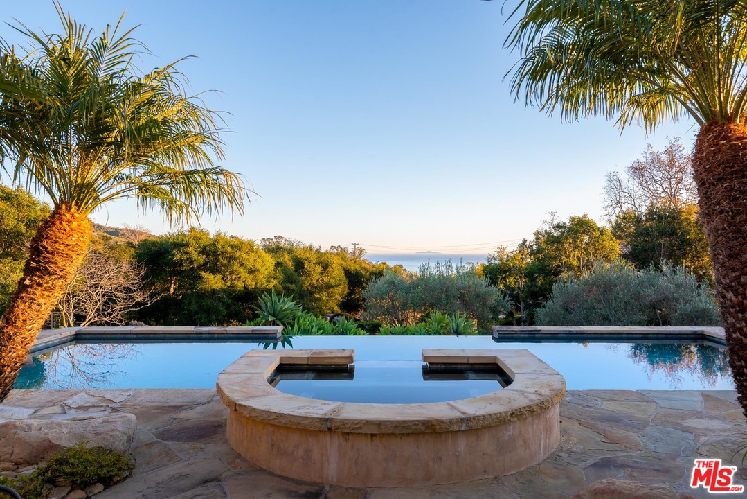 2838 East Valley Road Santa Barbara, CA 93108 - Photo 28 of 28 a view of a swimming pool with a patio