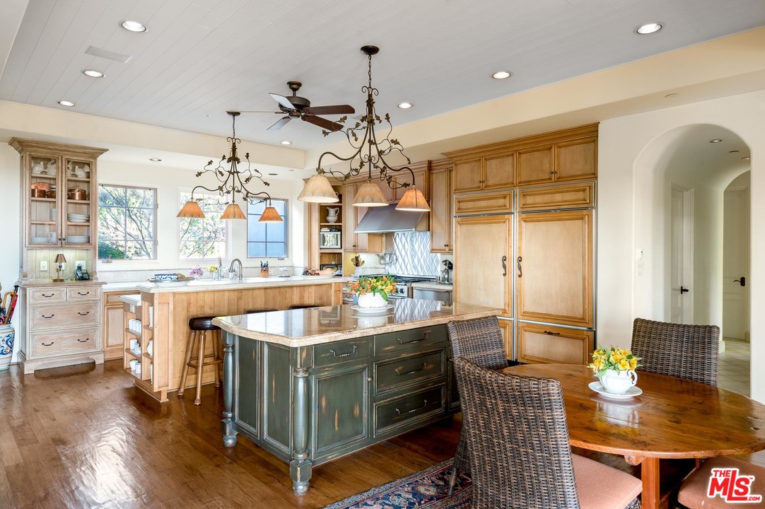 2838 East Valley Road Santa Barbara, CA 93108 - Photo 10 of 28 a kitchen with stainless steel appliances kitchen island granite countertop a sink and cabinets