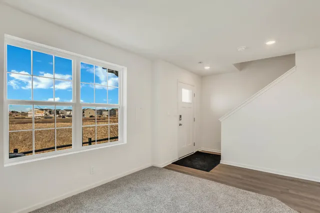 an empty room with windows