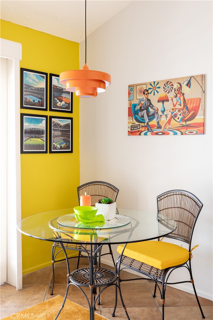 40657 Preston Trail Palm Desert, CA 92211 - Photo 17 of 46 a view of a room with a table and chairs