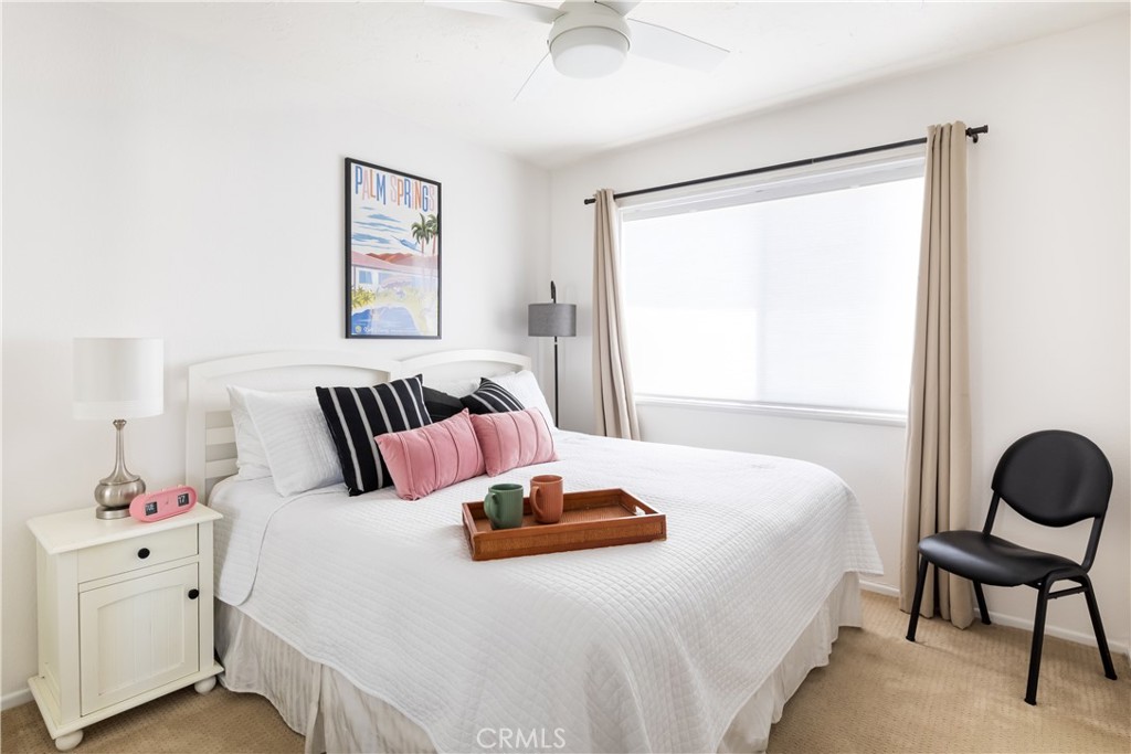 40657 Preston Trail Palm Desert, CA 92211 - Photo 22 of 46 a bedroom with a bed and a window