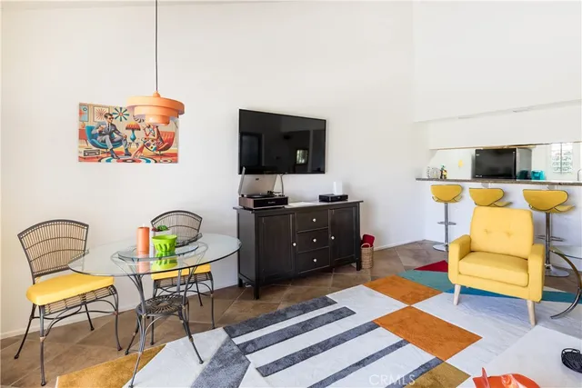 an aerial view of residential houses with outdoor space and river