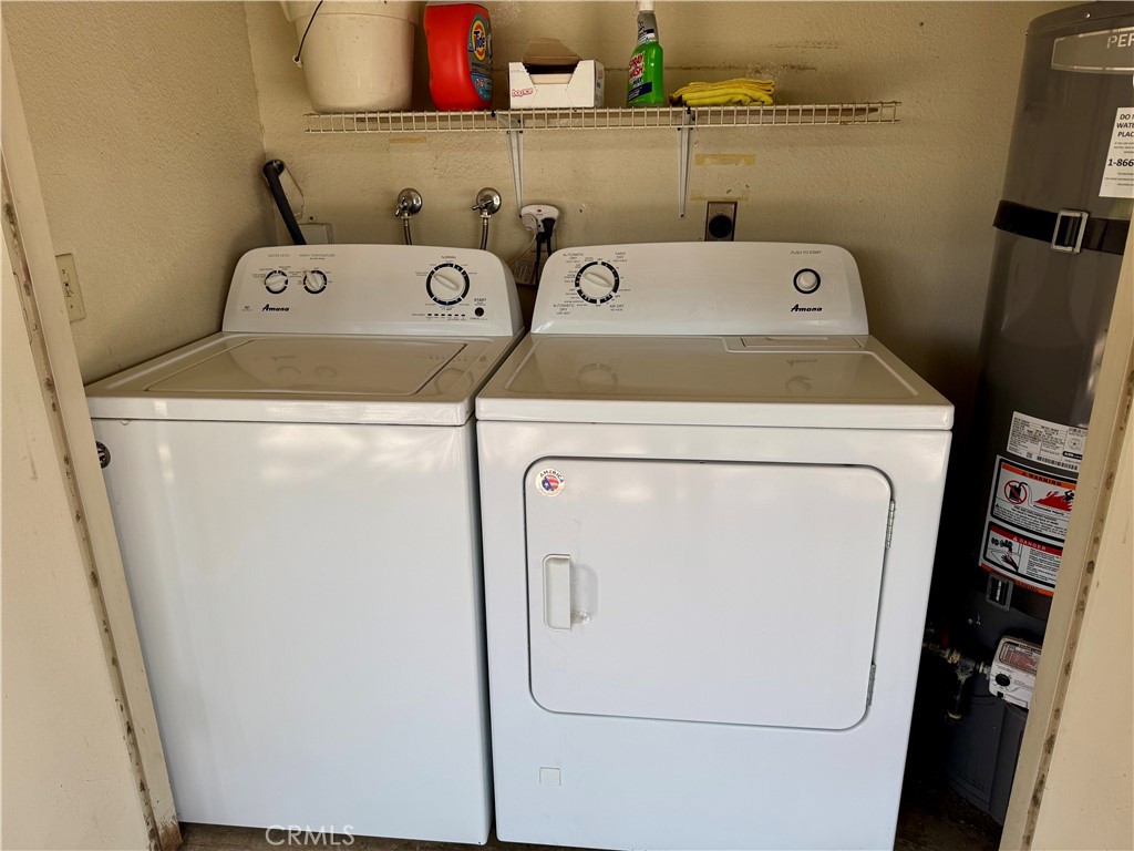 40657 Preston Trail Palm Desert, CA 92211 - Photo 34 of 46 a utility room with dryer and washer