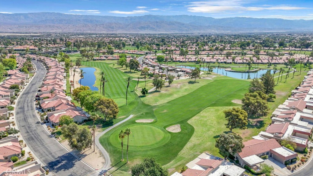 40657 Preston Trail Palm Desert, CA 92211 - Photo 35 of 46 an aerial view of residential houses with outdoor space and river