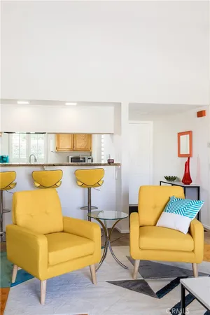 a living room with couch and a table