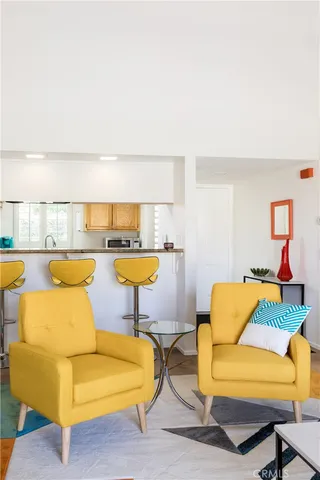 a living room with couch and a table