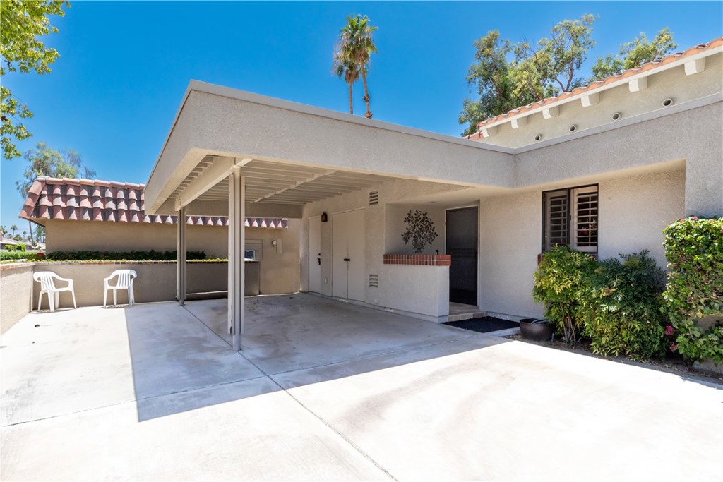 40657 Preston Trail Palm Desert, CA 92211 - Photo 44 of 46 a view of a house with a porch
