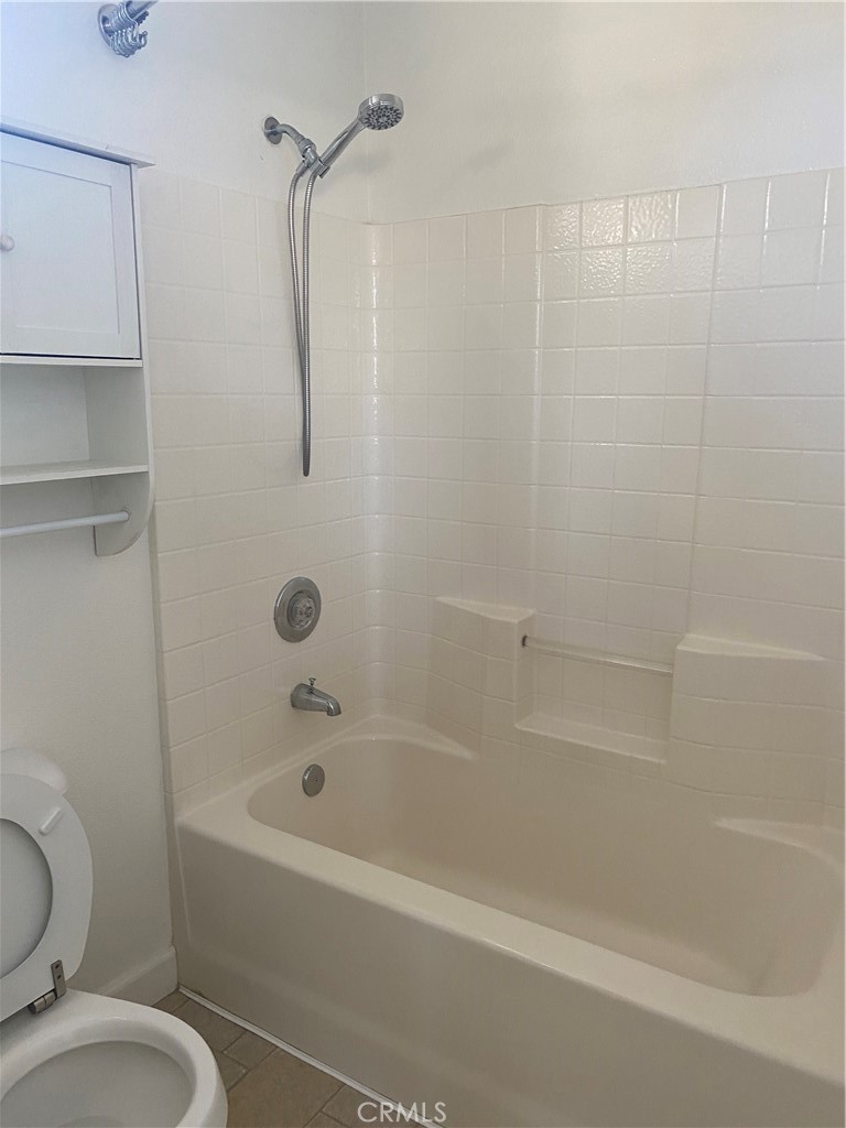 3301 Orangewood Irvine, CA 92618 - Photo 9 of 10 a bathroom with a toilet and a bathtub