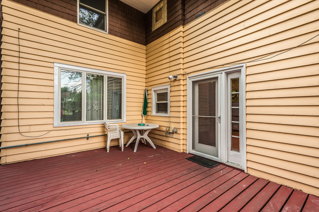 191 Lawton Road Riverside, IL 60546 - Photo 21 of 25 a view of a house with wooden deck
