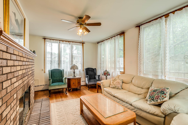 191 Lawton Road Riverside, IL 60546 - Photo 6 of 25 a living room with furniture and a large window