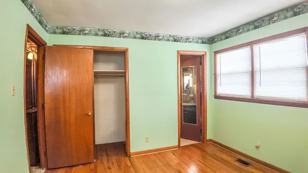 a bathroom with a sink and a large mirror