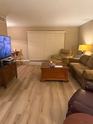 a living room with furniture and a couch