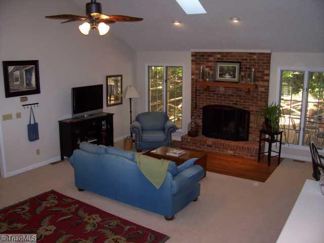 251 Lakeview Road Mocksville, NC 27028 - Photo 3 of 15 Den/Family/Great Room. Cozy den area with brick fireplace.