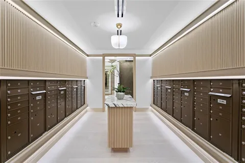 a view of a kitchen with dining space and wooden floors