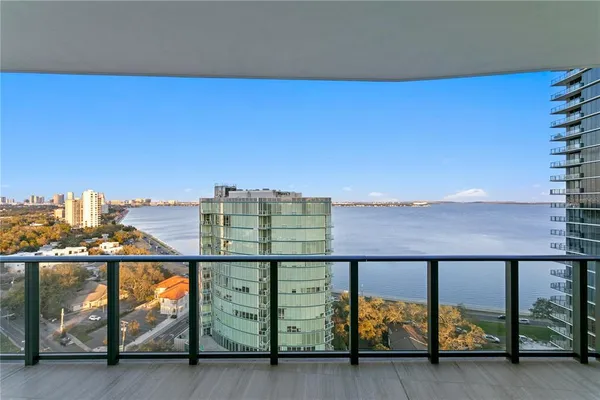 a view of a balcony with city view