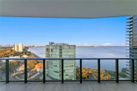 a view of a balcony with city view