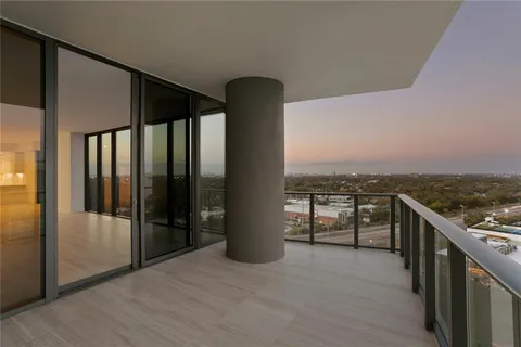 a view of a balcony with an outdoor space